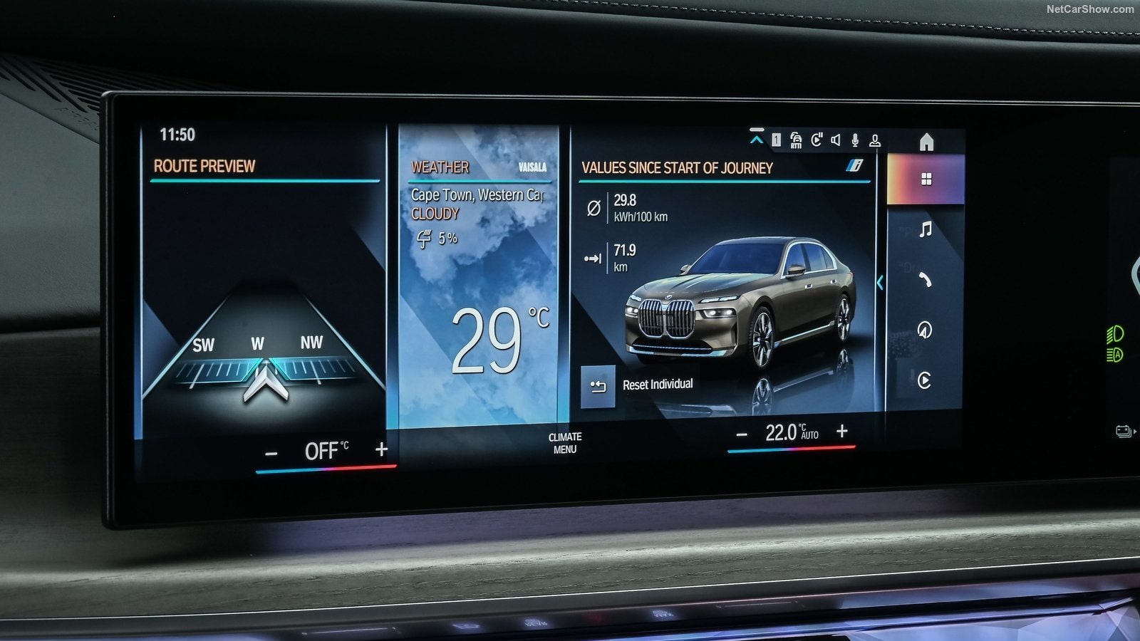BMW i7 central media console showing route preview, the weather and vehicle values.