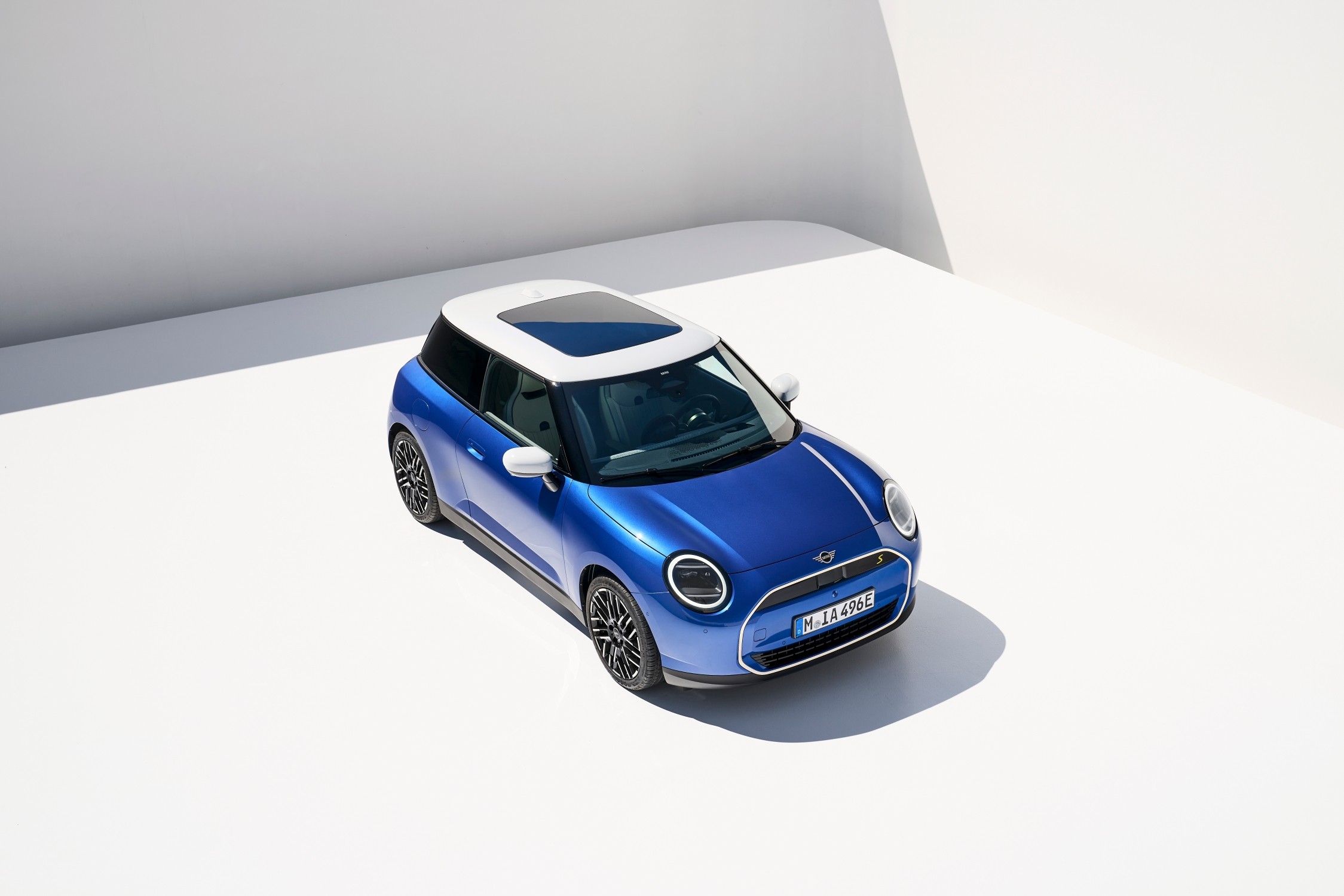 Blue Mini Electric front quarter angle